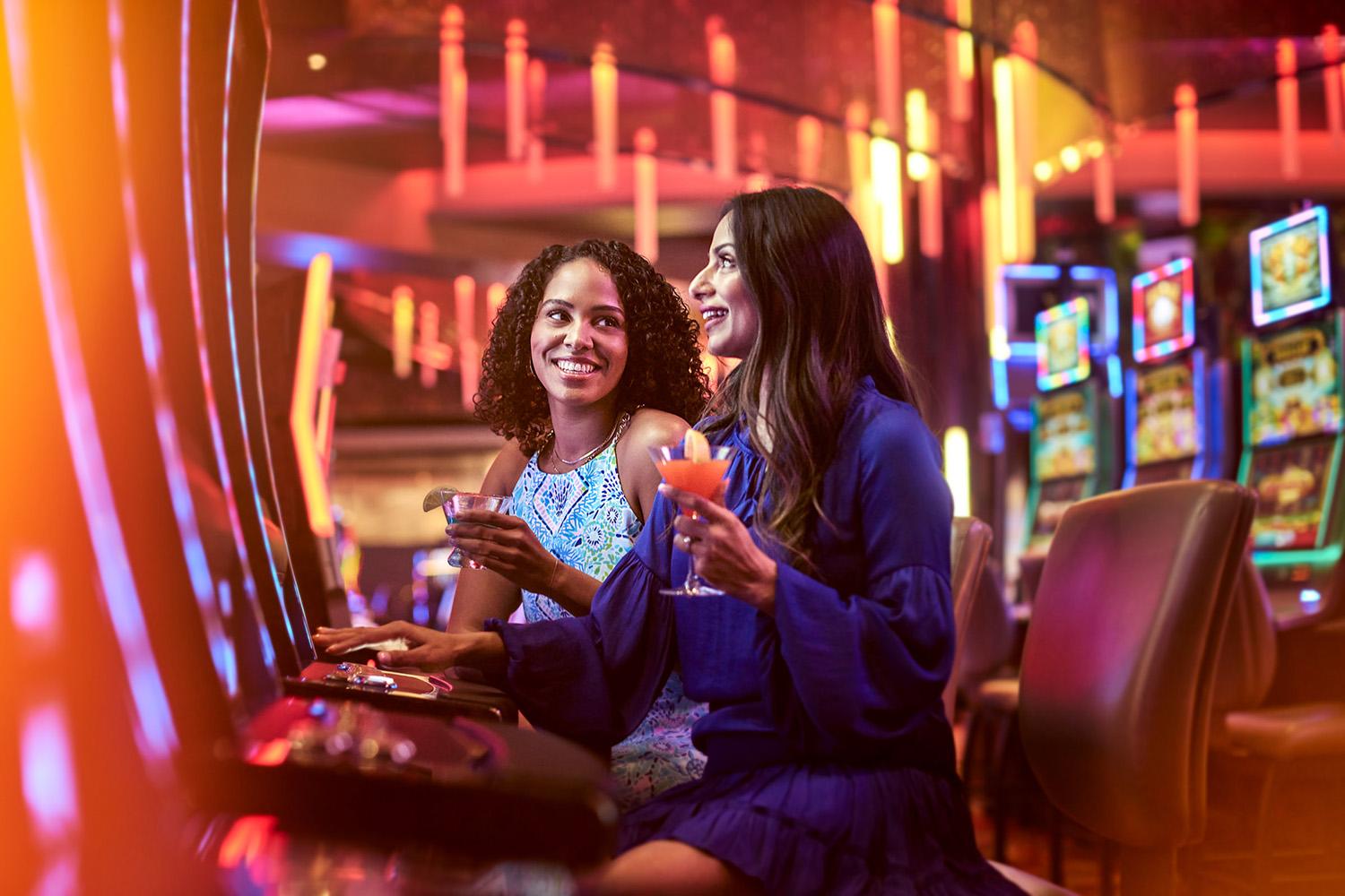 Two women playing games at Wind Creek Wetumpka